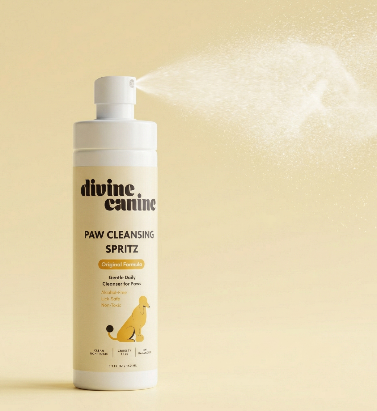 Divine Canine Paw Cleansing Spritz Original Formula bottle being sprayed on a beige background