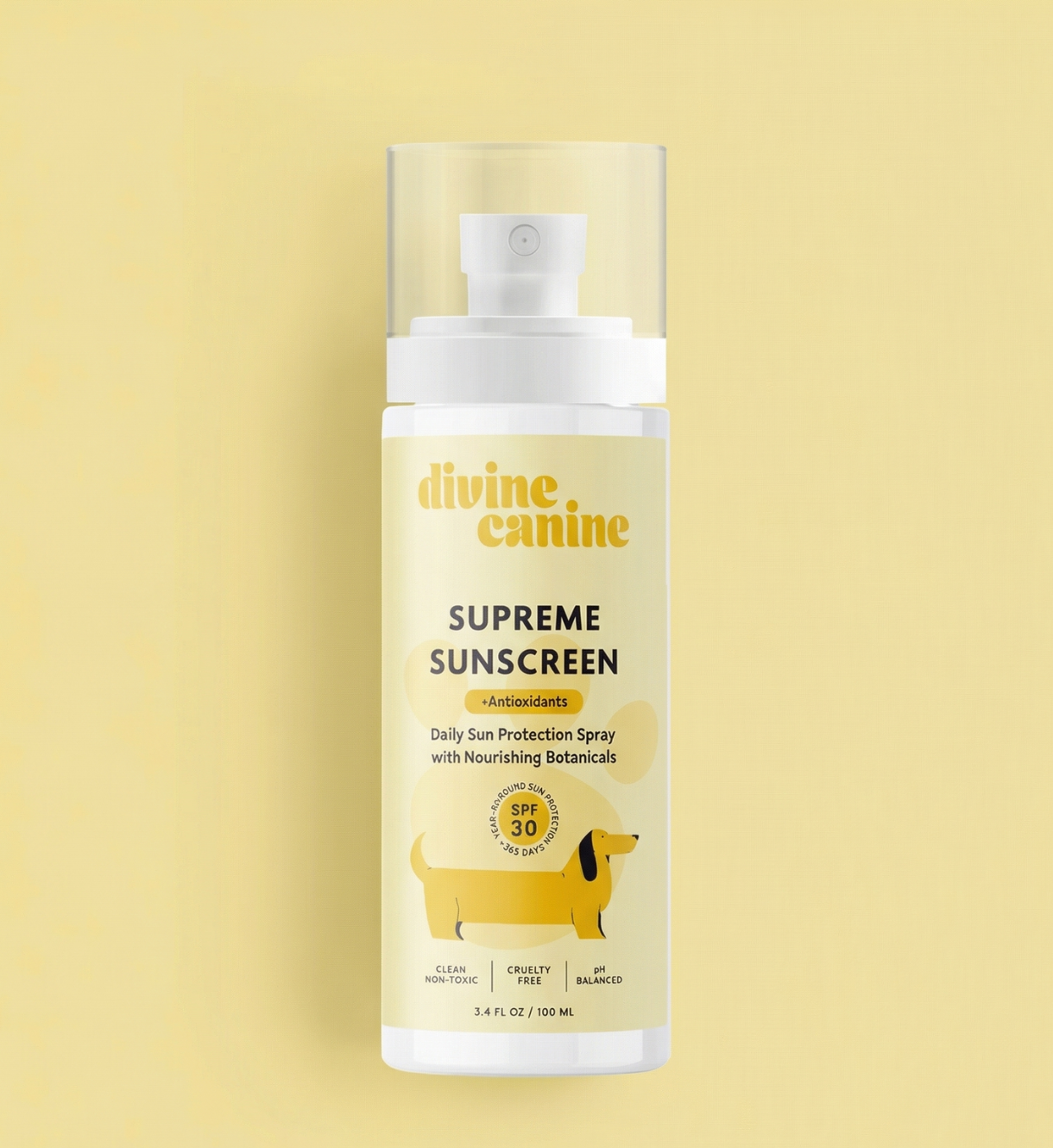 Divine Canine Supreme Sunscreen 3.4 fl oz spray bottle on yellow background
