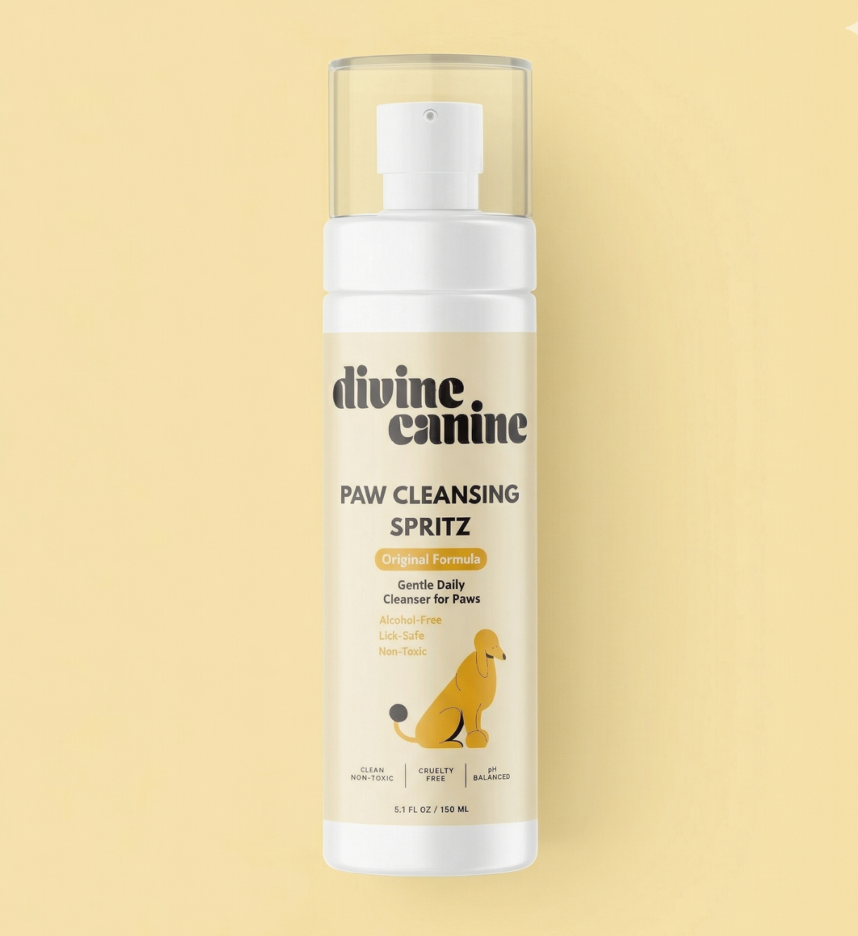 Divine Canine Paw Cleansing Spritz Original Formula bottle laying flat on a beige background