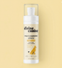 Divine Canine Paw Cleansing Spritz Original Formula bottle laying flat on a beige background