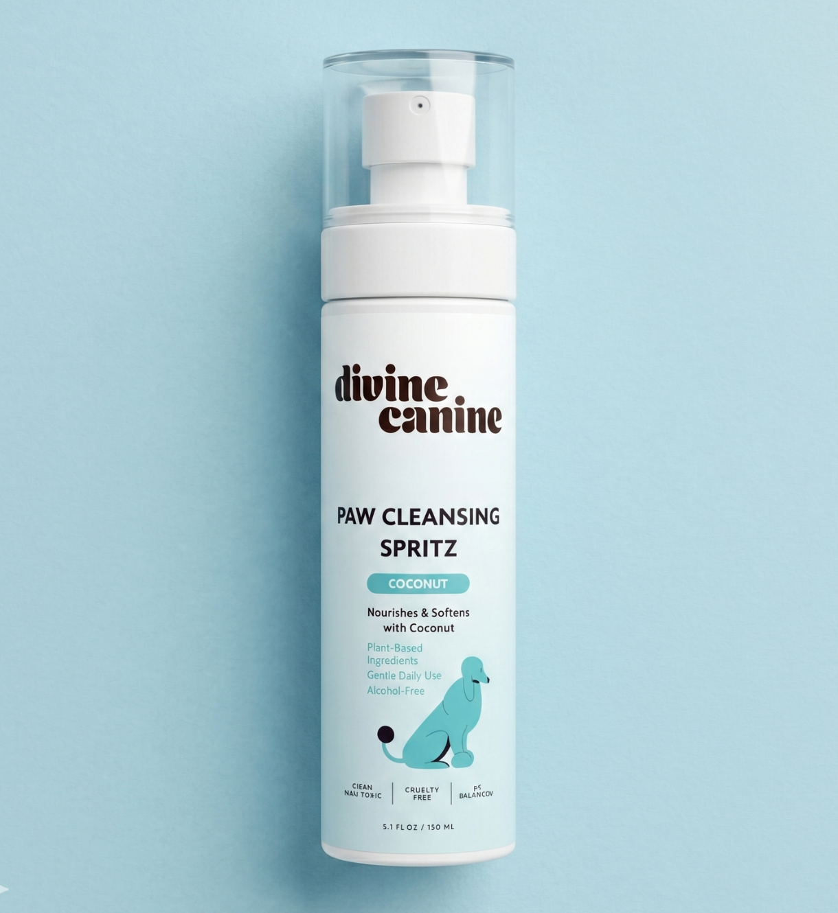 Divine Canine Paw Cleansing Spritz with coconut bottle on a light blue background