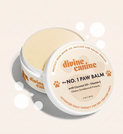 Divine Canine paw balm with packaging on a light background